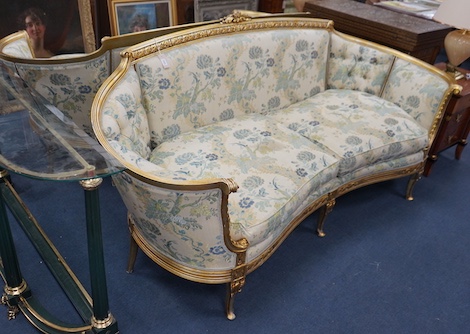 A pair of contemporary Louis XVI style gilt framed tub shaped settees with loose cushion seats, length 210cm, depth 65cm, height 95cm